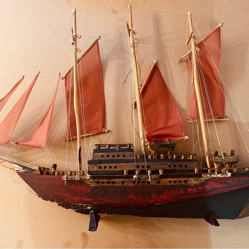 Vintage Wooden Ship Model with Red Sails